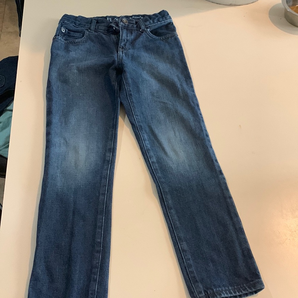 Skinny jeans with adjustable straps